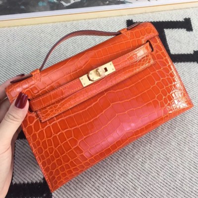 Hermes Orange Kelly Pochette Shiny Niloticus Crocodile Bag